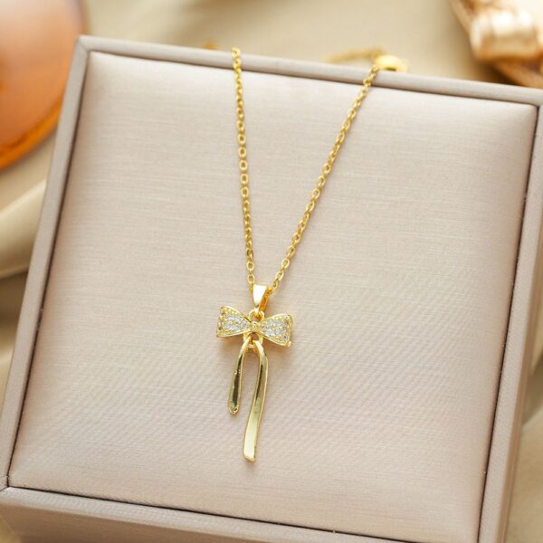 CHARM BOW NECKLACE