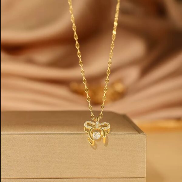 Golden Infinity Bow Necklace